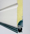 insulated sectional door panel and bottom rubber seal