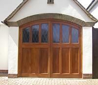 purpose made cedar door for arched garage opening
