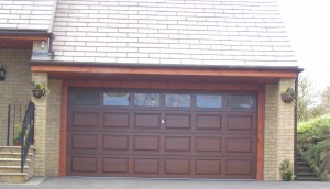 sectional cedar timber garage door driveway house