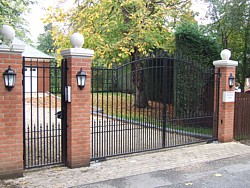 Pair of steel swing gates and matching side gate in Cambridgeshire