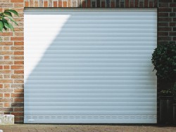 White roller shutter garage door with ventilation slats to help air circulation