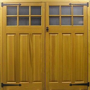Antique hinges on glazed side hinged doors