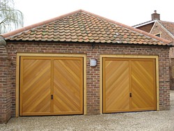 Pair of Hormann chevron cedar timber garage doors in Nottingham