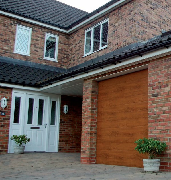 Gliderol Panel-Glide ribbed Tuscan with a timber planked style door