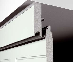 Insulated sectional door infill fascia