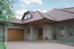 Hormann Sectional Garage Door with arched building and matching front door