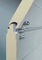 insulated sectional door panels with finger trap protection