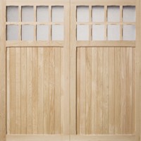 Vertical Oak boarding with timber window bars and glazing