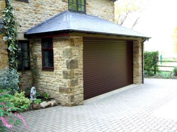brown Seceuroglide roller garage door in Great Billing, Northamptonshire