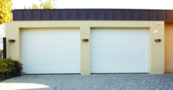 sws roller shutter white matching garage doors on driveway