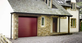 red seceuroglide garage door installed on new build home