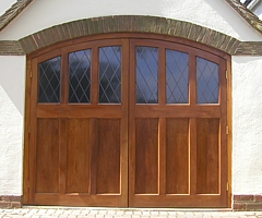 Arched timber side hinged doors