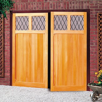 Side hinged timber doors with glazing and leading
