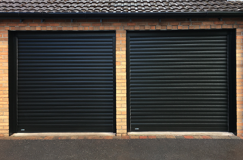 Pair of single size roller garage doors