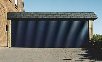 Large garage door in blue finish, aluminium slats