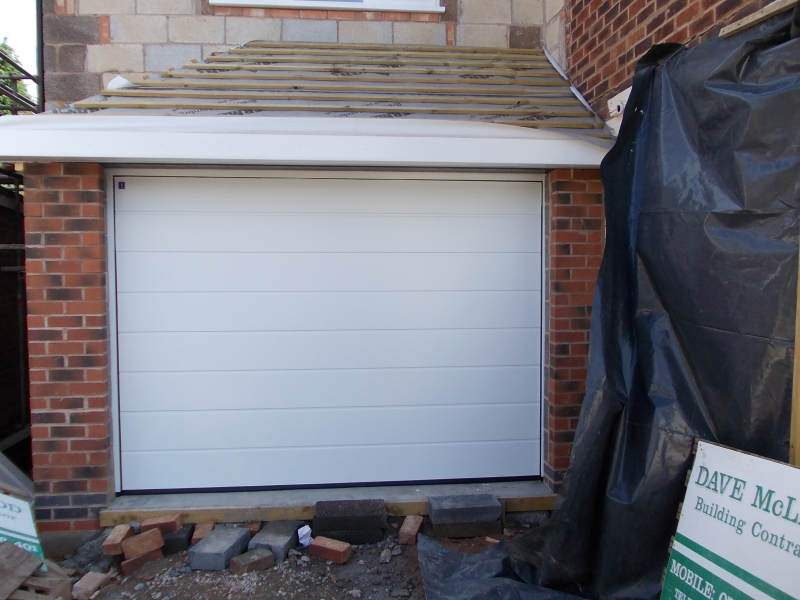 Single Hormann LPU40 M ribbed steel sectional in white