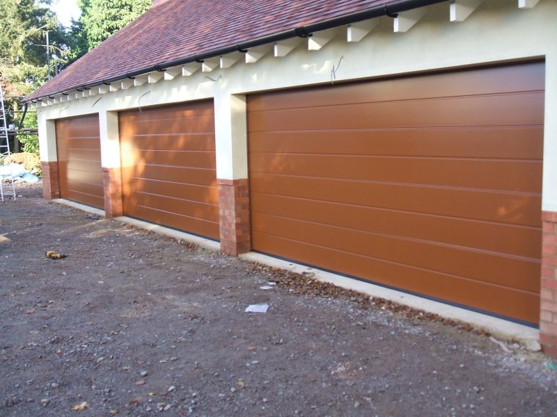 Three Hormann LPU40 M ribbed steel sectionals in brown