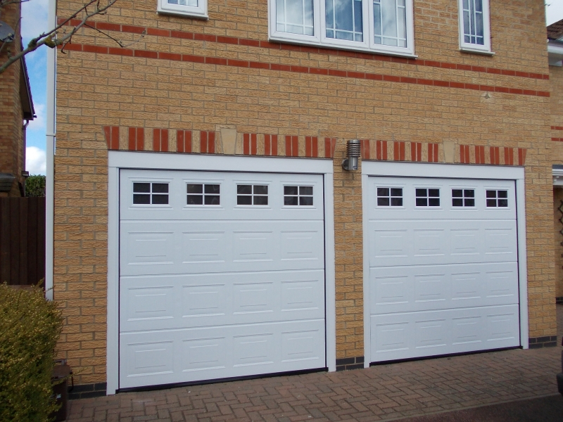 Twin Hormann S panelled georgian steel Sectional with windows in white