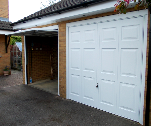 Two White Hormann 2004 Georgian Up and Over Steel