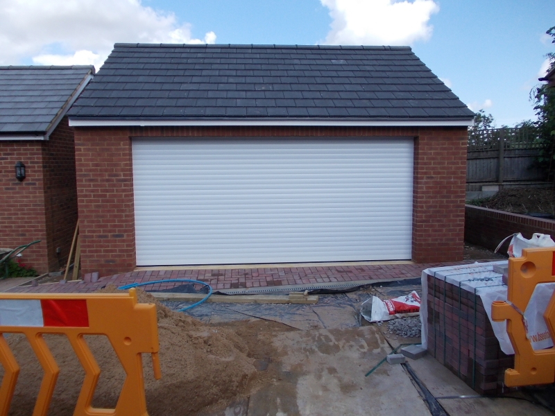 Double SWS Seceuroglide aluminium roller door in white