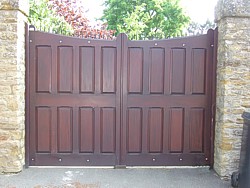 Hardwood panelled timber swing gates