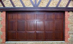 Hormann double timber garage doors with Iroko panelled infill in Northampton