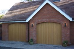 rundum meir round the corner garage door in arched openings