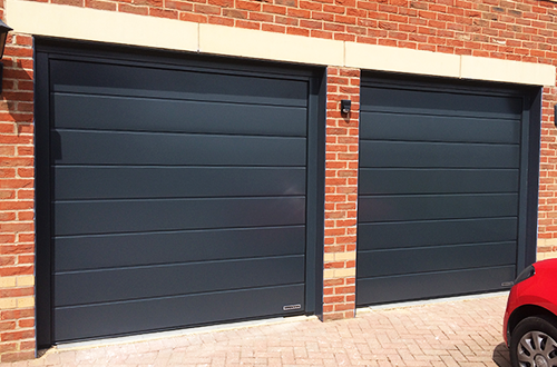 Pair of Single Width Hormann Sectional Garage Doors