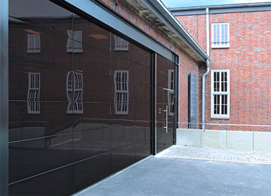 Glazed garage door and pedestrian door