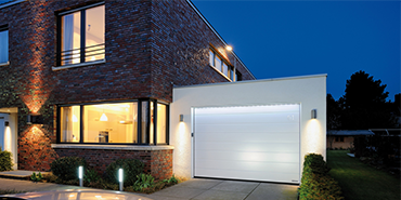 White sectional garage door Secured by Design