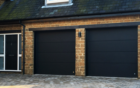 Pair of Ryterna Sectional Garage Doors