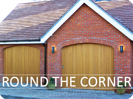 Timber sliding round the corner garage doors