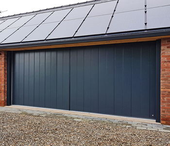 Modern round the corner garage door in Anthracite 