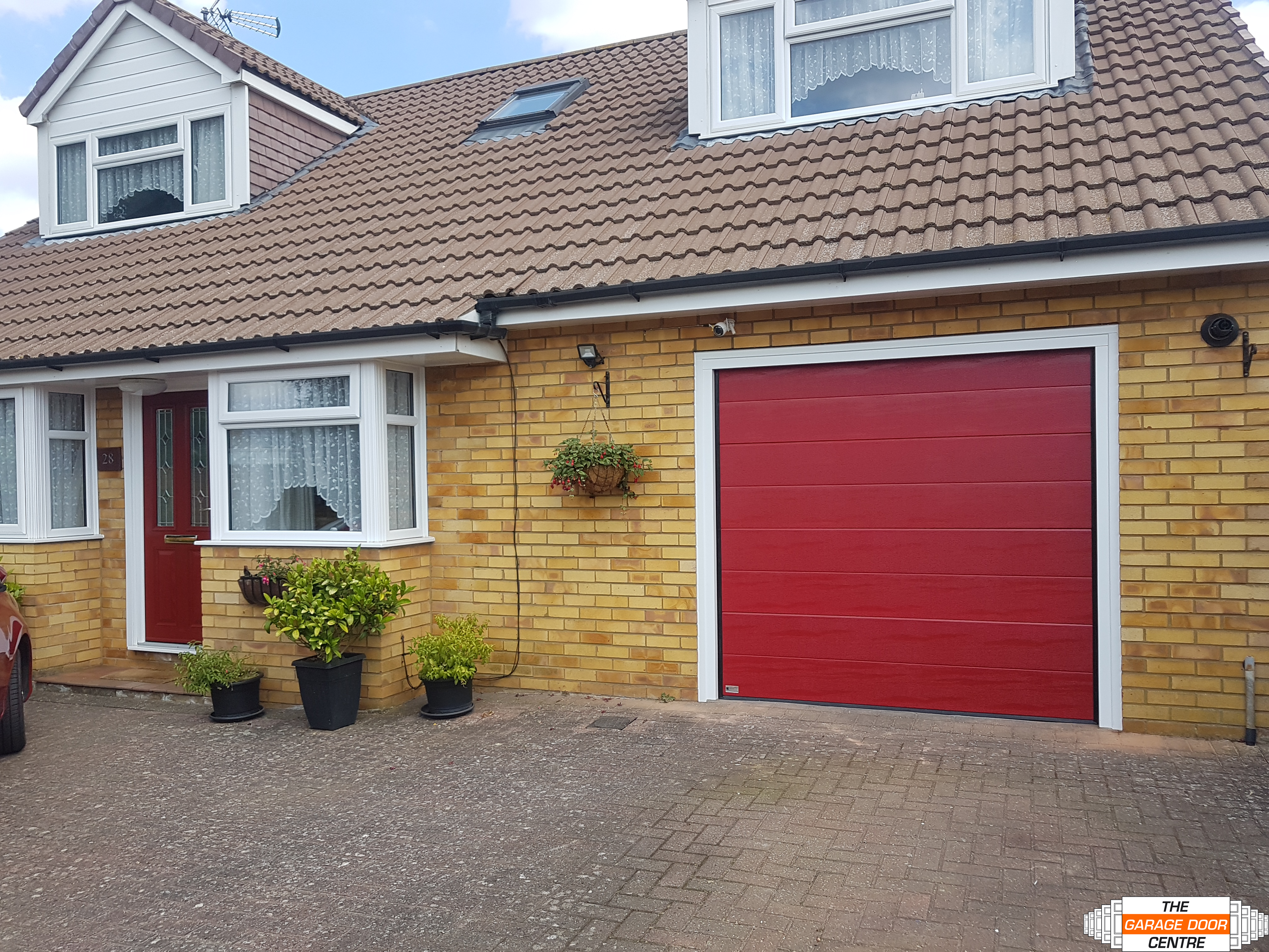 Matching Garage Door with entrance door in red