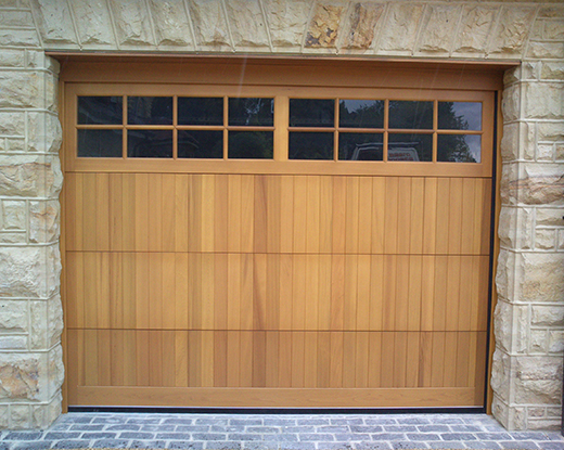 Sectional door in timber