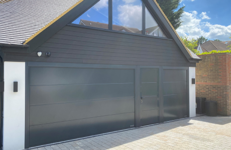 Hormann L Ribbed sectional with matching side door in anthracite colour