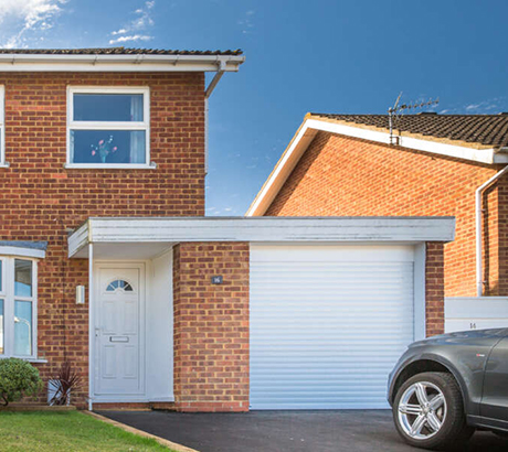 Carteck Traditional side hinged doors in white with windows and cross design