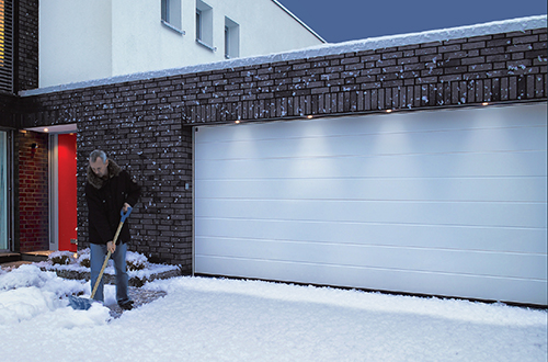 Weather sealed Sectional Door in the snow