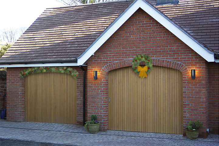 Garage door with wreaths