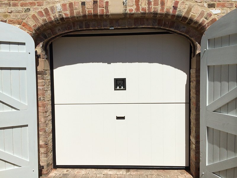 Cream Overlap Trackless Sectional Door