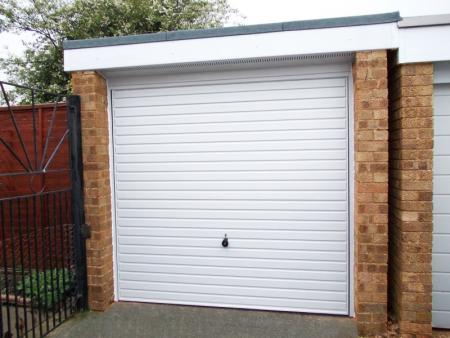 White Horizontal ribbed Hormann steel up and over