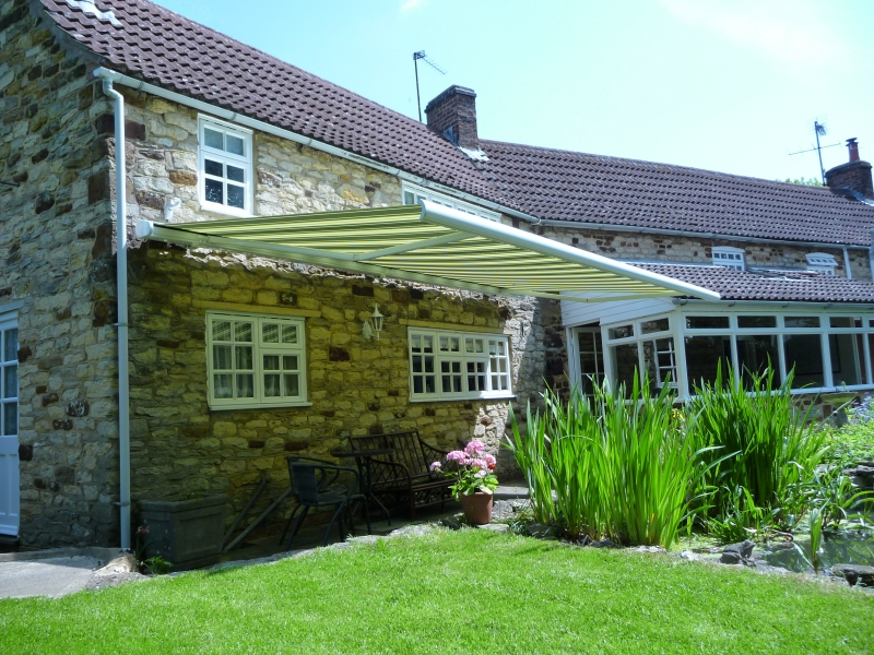 Large Green and Cream Striped Markilux 990 Patio Awning